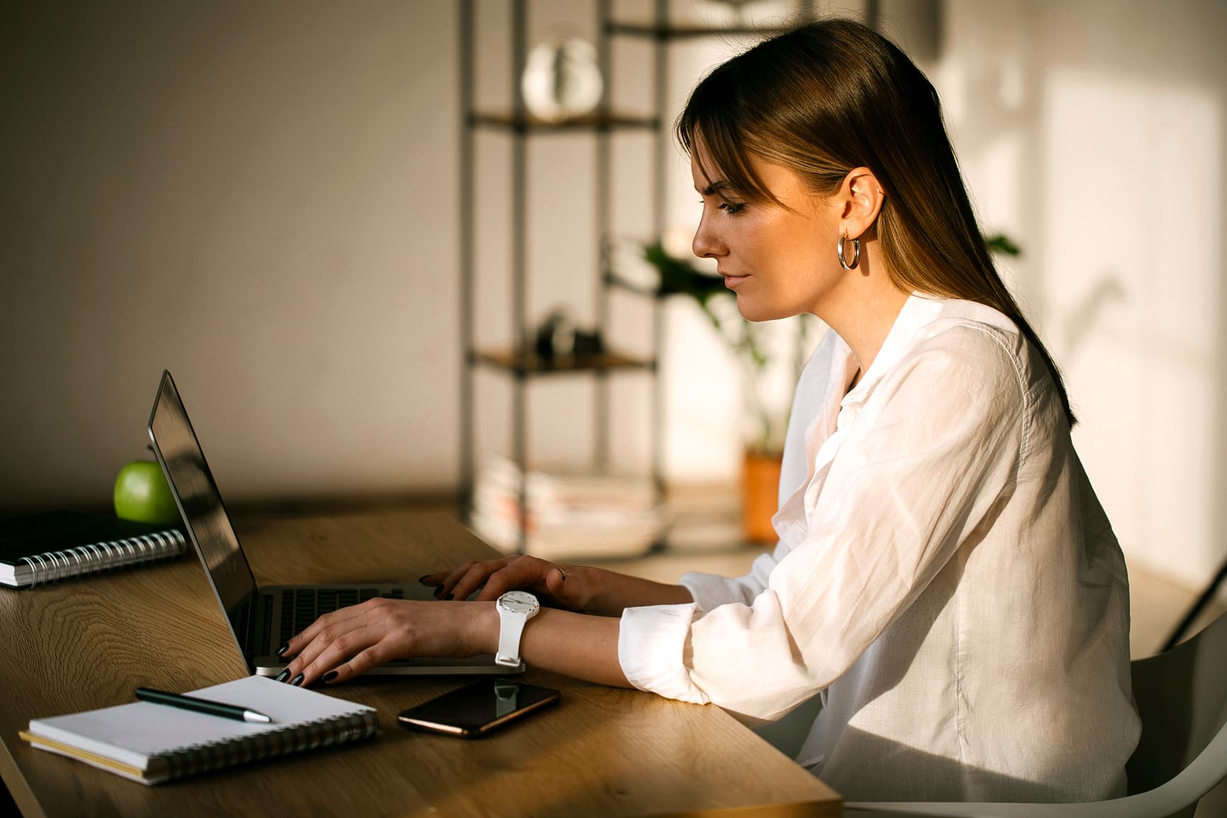 Young  woman Working On A Laptop